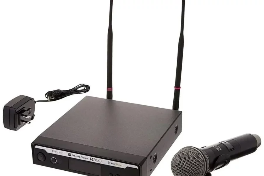 A black Electro-Voice R300-HD Wireless Handheld Microphone System, consisting of a rectangular receiver with two tall antennas, a black handheld microphone with a silver grille, and a black power adapter.