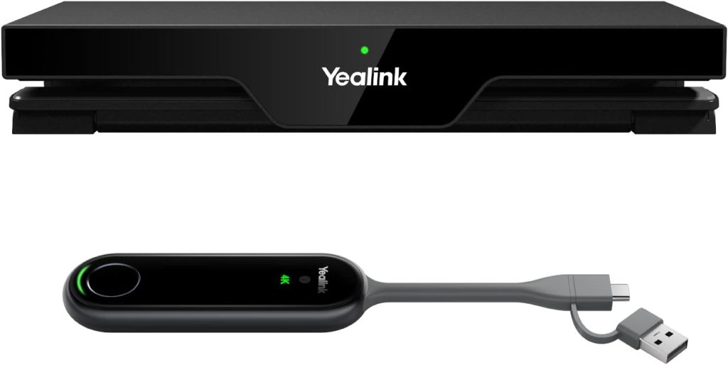 A close-up of a Yealink wireless presentation system, featuring a rectangular black hub with "Yealink" printed in white on the front and a green LED light above it, and a sleek, black, oval-shaped dongle below it. The dongle, also labeled "Yealink 4K", has a glowing green ring around a circular button on its left, a green LED light in the center, and a grey cable extending to the right, splitting into a USB-C and a USB-A connector.